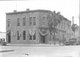 Photo of old brick building in the early 1900's [Image by creator Sherlop solutions from ]